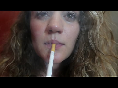 blonde teen does a nice suck to a toy while smokes!