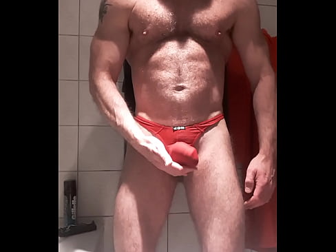 MUSLED HAIRY IN RED THONG