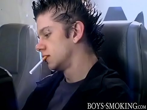 Pierced dude masturbates while smoking