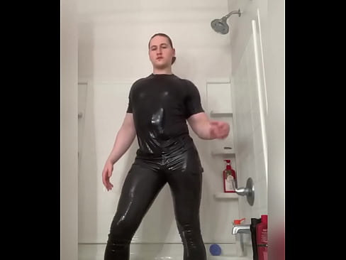 Hunk in skintight trousers gets soaked