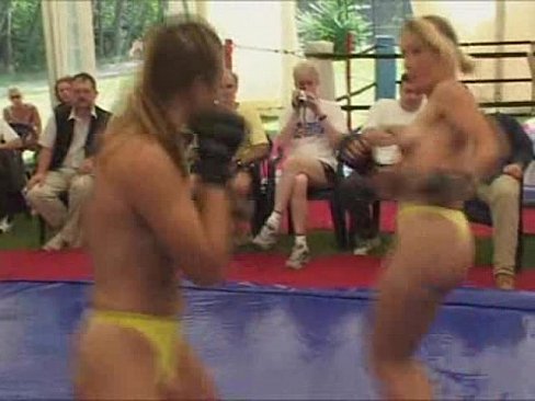 Topless women fight