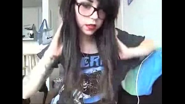 emo looking girl in big specs in t shirt and tiny panties and socks