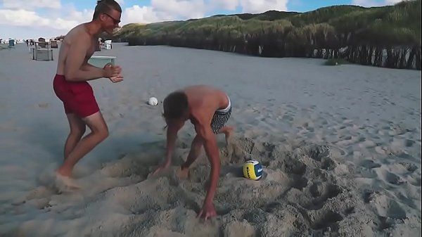 Hot guys play Football on beach (no sex)