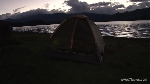 Sex with his girlfriend in a tent in the field