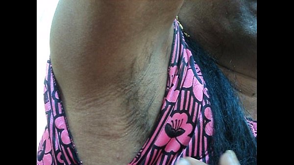 Indian girl shaving her armpits hair by a sharp edged straight razor smooth and clean ..AVI
