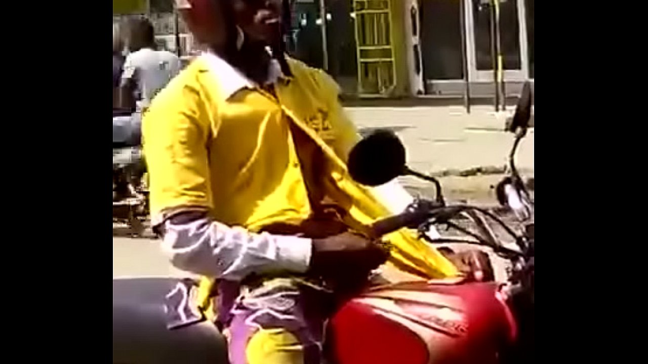 Motorbiker stroking his meat