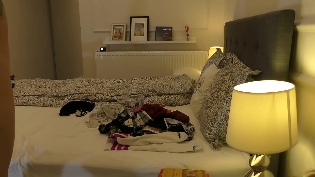 Nudist girl goes solo in the bedroom