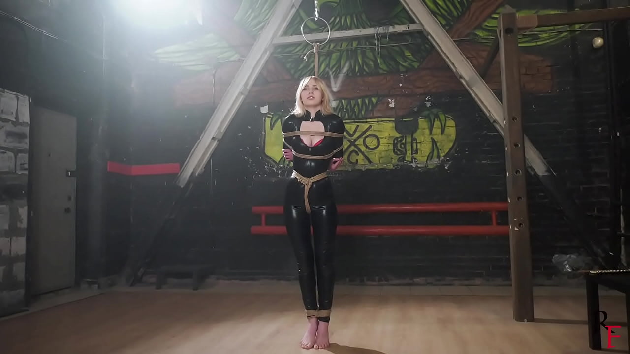 Bondage seance with submissive Olivia in catsuit