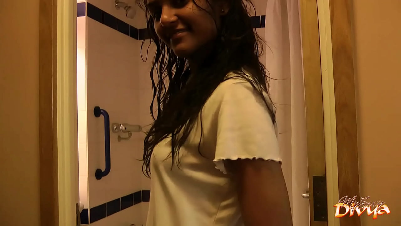 Indian girl taking shower in bathroom