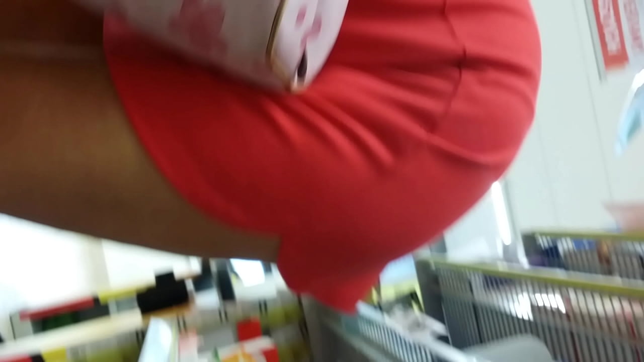 Upskirt milf in store