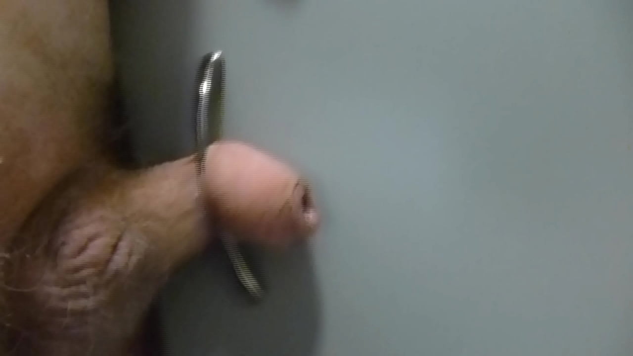 Sliding my cock back and forth on a cabinet handle and cumming