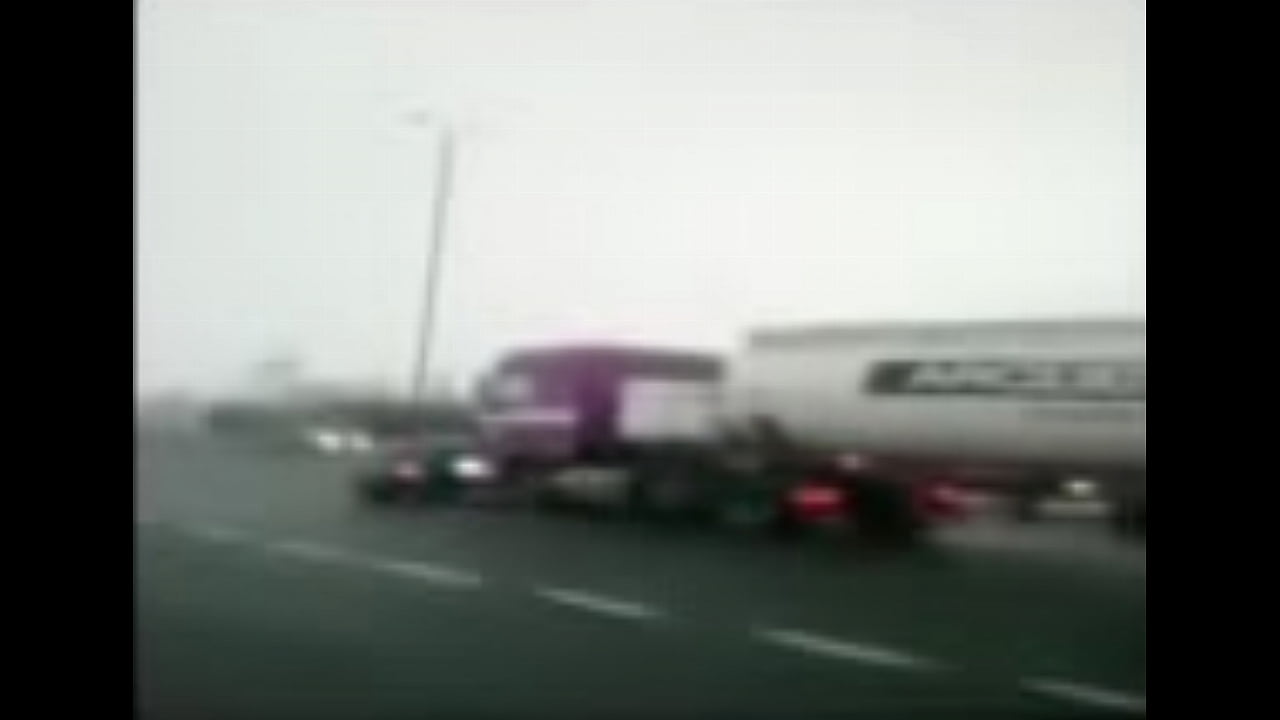 Semi Pushes Car Down Freeway