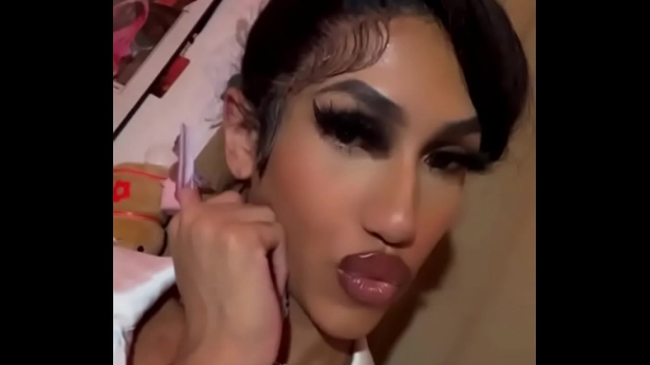 Sexy Young Transgender Teen With Glossy Makeup Being a Crossdresser