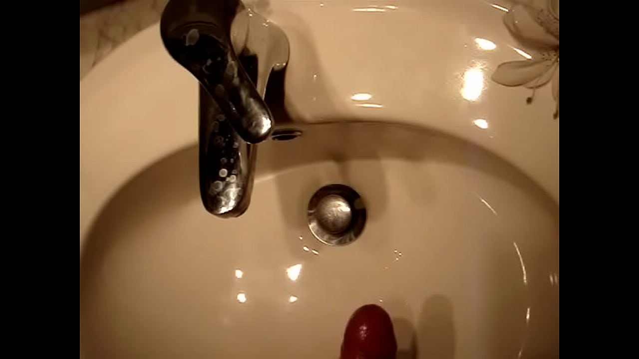 Portuguese jerk off finishing on bathroom sink