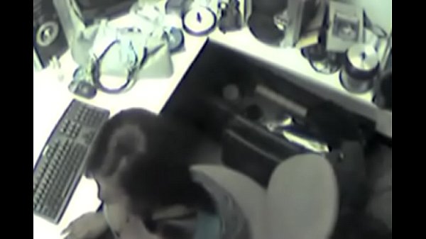 Bored secretary spied as she masturbates