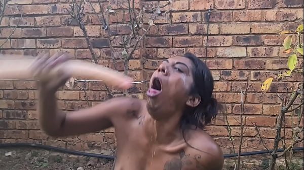 Sitting outside making myself puke and gag as I deepthroat a long dildo, desi Indian slut