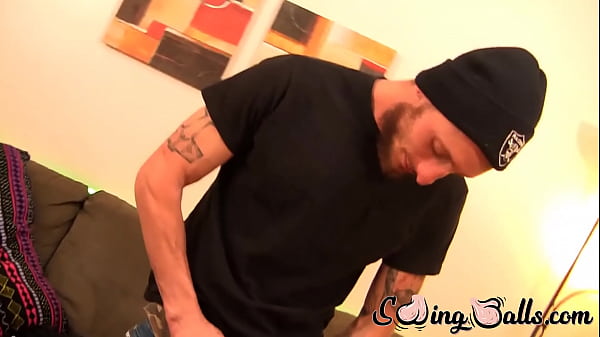 Inked young homo wanks rock solid cock