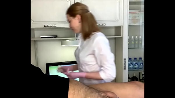 Deep depilation of men's bikini to a client with a piercing on his forehead