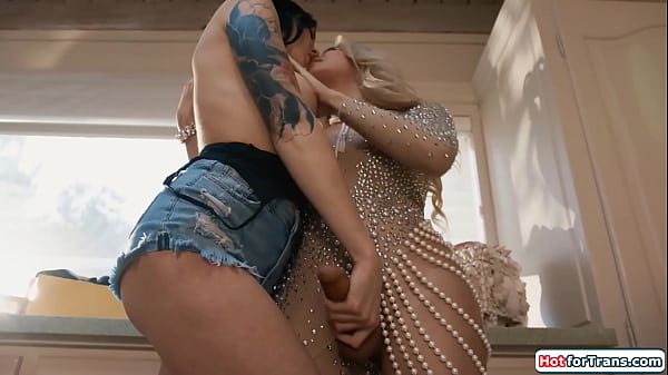 Theres a busty tgirl spirit in the ring who is ready to helps out with her big hard tranny dick.Big tit shemale Ariel Demure facefucks Charlotte Sins 