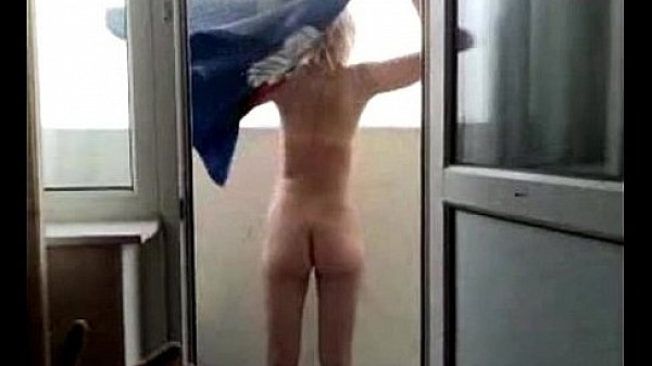 Naked girlfriend on the terrace