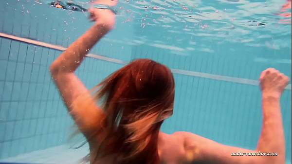 Hungarian babe Dona enjoys being naked in the pool