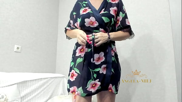 MILF in a black bodysuit, takes off and shakes her breasts  