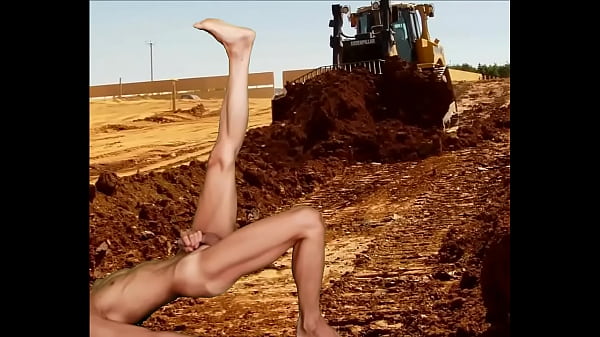 Bull dozer shoveling cock  