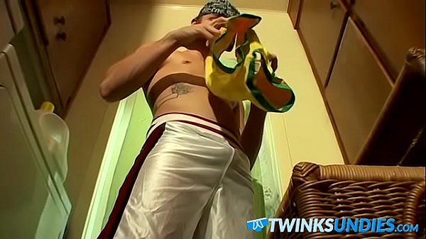 Handsome guy in boxer pants wanks solo