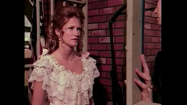 Busty blonde Teri Weigel gets fucked with long and hard dildo by kinky whores in prison 