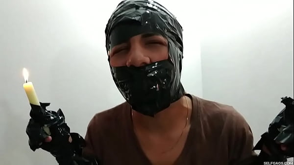 Gagged Bondage Girl Used As Candlelight Holder  