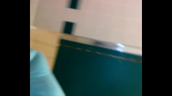 Busty MILF sucking big dick in rest area bathroom