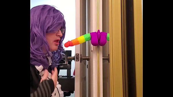 maid performing oral on a fake falus