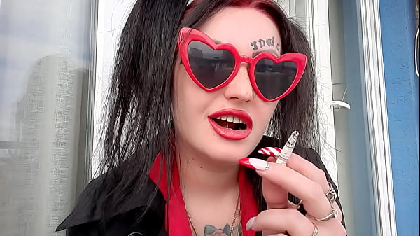 Mistress smokes 2 cigarettes and blows smoke in your face. Sexy red lips and cigarette smoke. 