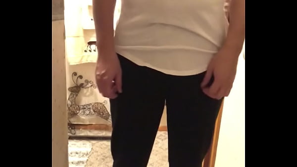 Male takes a pee and messes with penis 