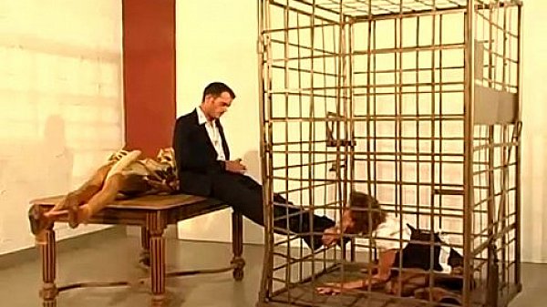 German secretary girl licks feet and sucks cock of her boss in cage