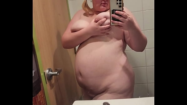 Quick tease in public bathroom