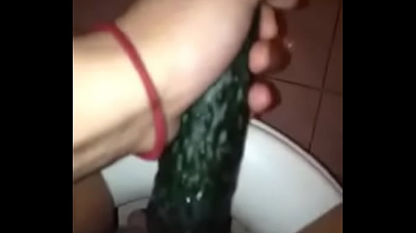 girl masturbathing with cucumber