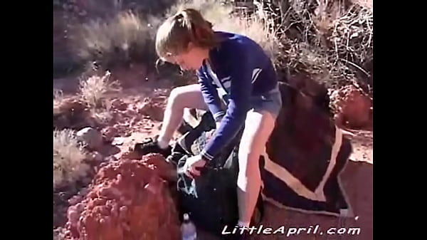 Little April hiking outdoors and then touching her 18yo pussy