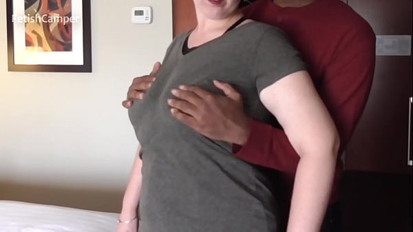 Squeezing huge tits