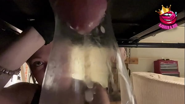 Mistress milks his ruined cumshots into a glass closeup