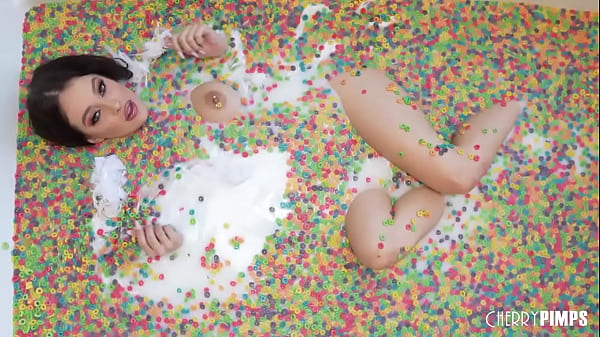 This solo scene with Cherry of the Month Maddy May is playful and fun as she rolls around in a tub of cereal. You'll want to eat her up while she plays with her big tits.