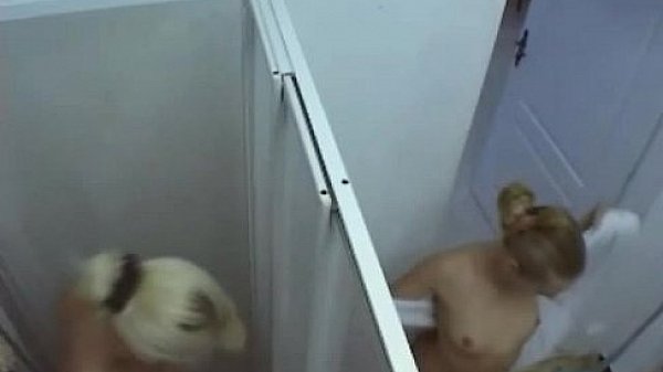 Two horny lesbians sluts cherishing their pussies before using a dildo