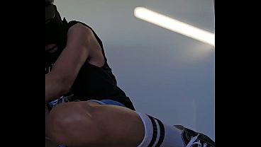 Masturbator in short jeans, white socks and converse sneakers  