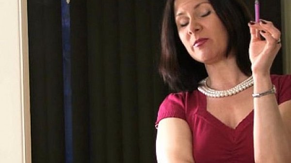 Sexy smoker MILF talks while smoking