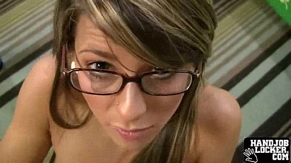 Hot girl with glasses hanldes two cocks