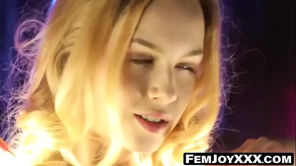 Gorgeous Alecia Fox teases amidst a backdrop of shimmering lights, evoking a captivating allure akin to a goddess.