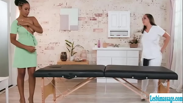 Busty ebony goes to the massage parlor and lets her sexy masseuse massage her body.After that,they get horny and start kissing each other passionately.Next is,the masseuse gets naked and then they start licking each others wet pussy.