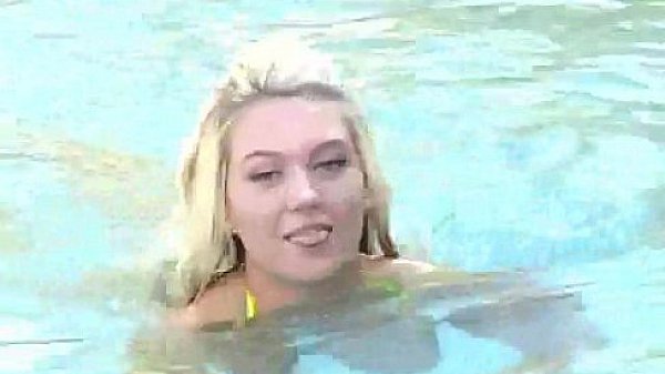 Busty teen in the pool