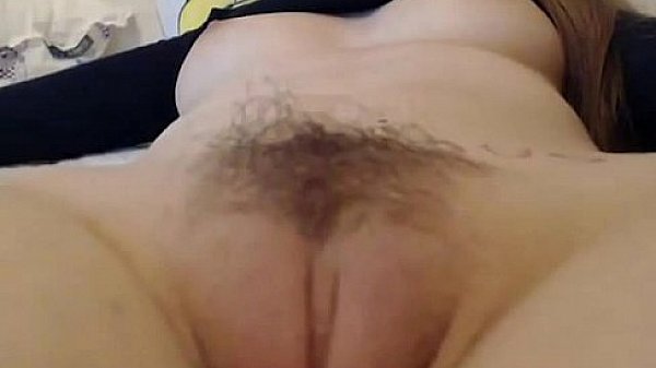 Brunette shows off her pussy on cam