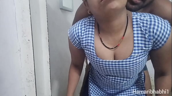 Indian college teacher with student.  